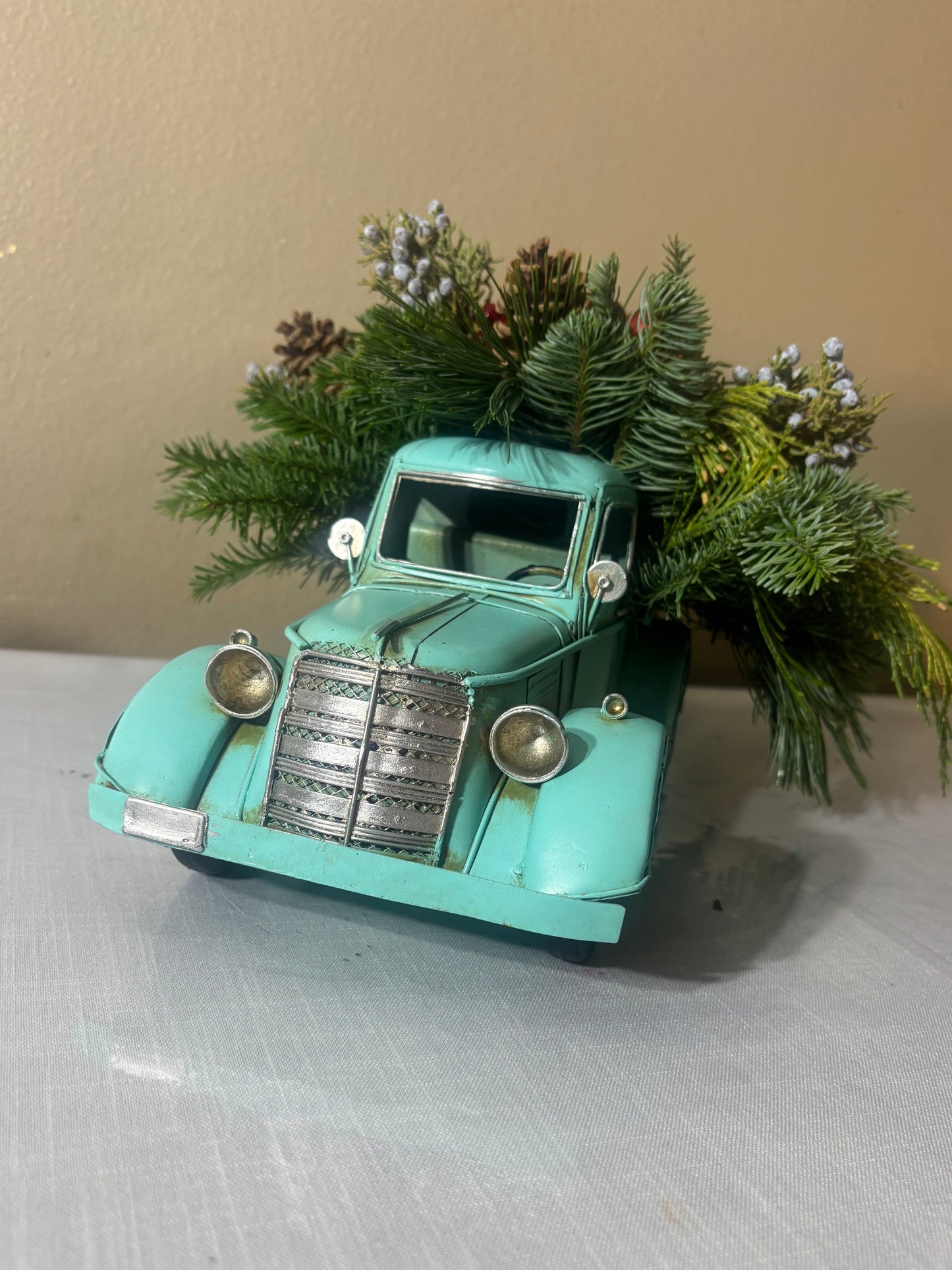 Turquoise metal truck
