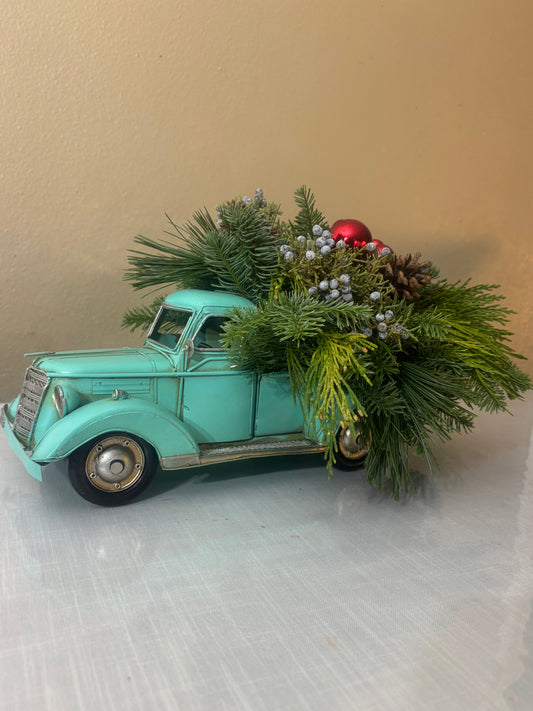 Turquoise metal truck