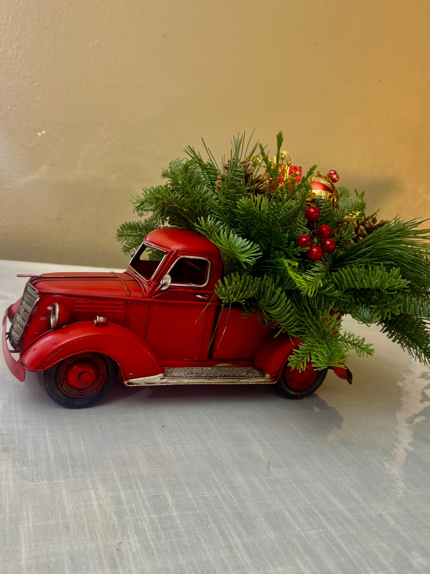 Red metal truck centerpiece