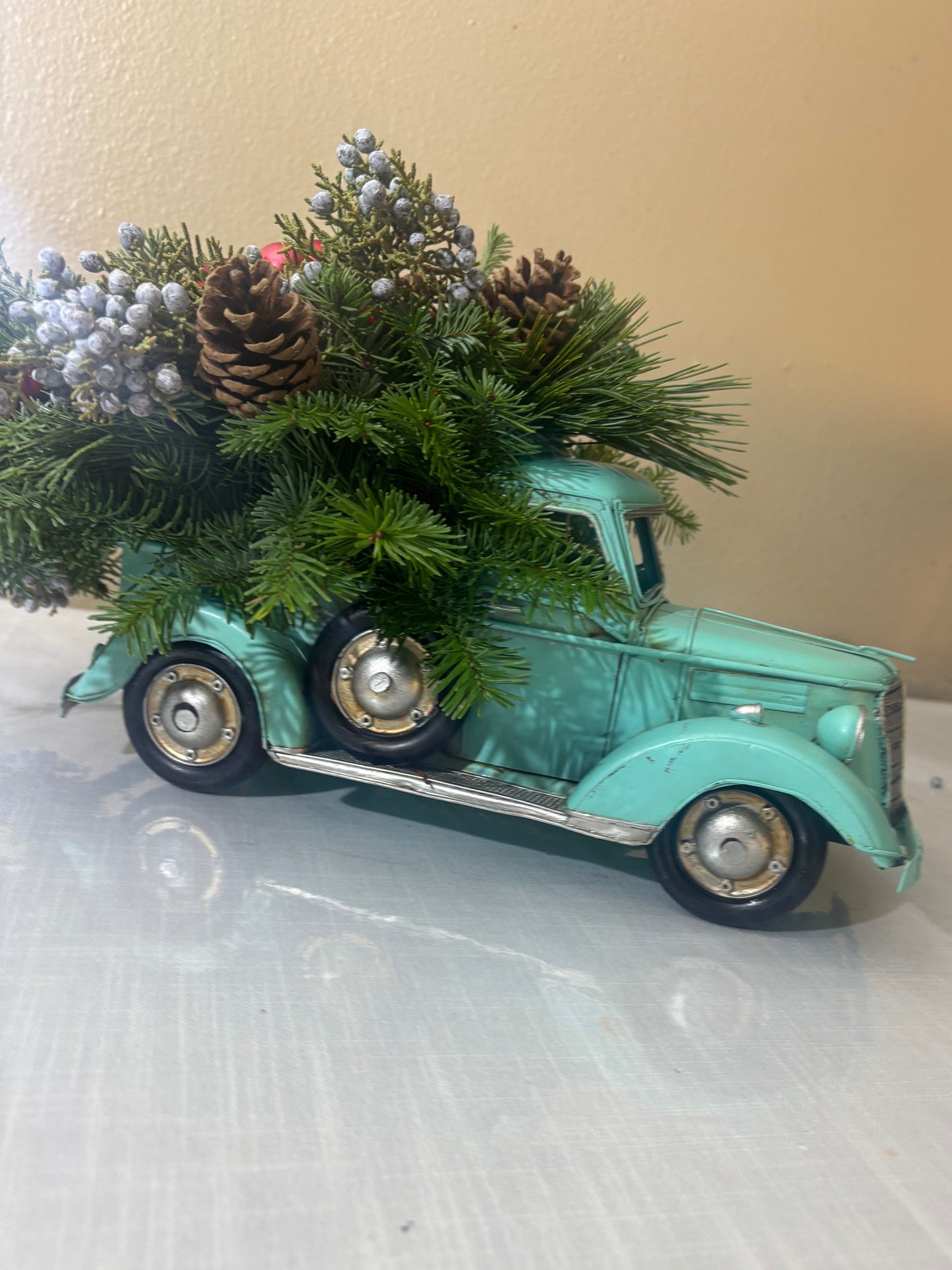 Turquoise metal truck